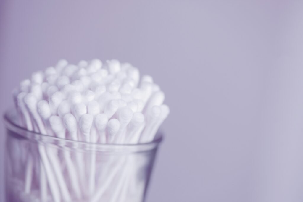 white cotton buds in container